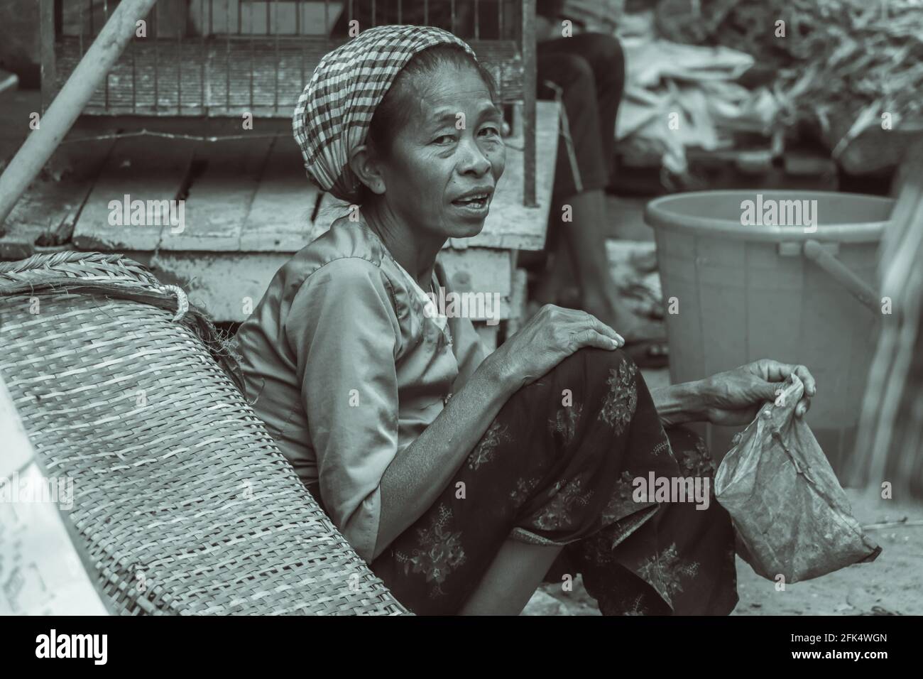 Bandarban , Bangladesh - 1 march 2020 ; working Tribal woman in local market . Stock Photo