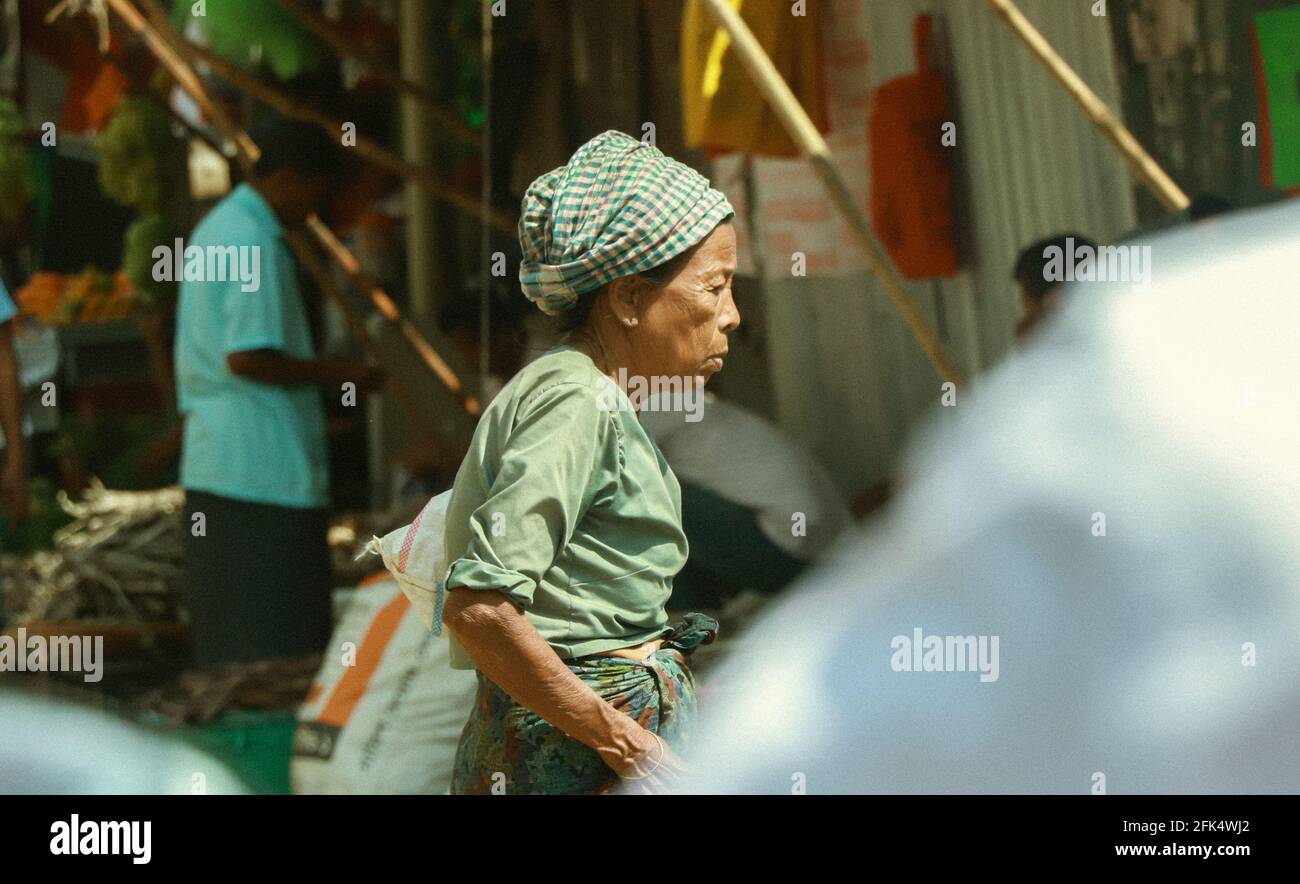 Bandarban , Bangladesh - 1 march 2020 ; working Tribal woman in local market . Stock Photo
