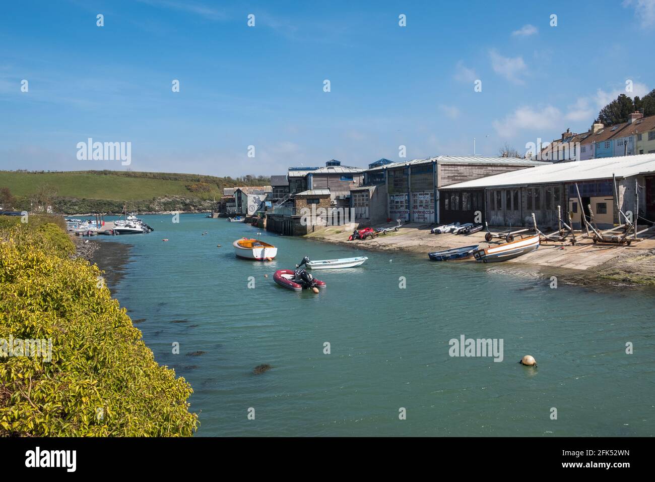 Small boats moored in Shadycombe Creek, Salcombe, South Hams, Devon with small boat yards Stock Photo