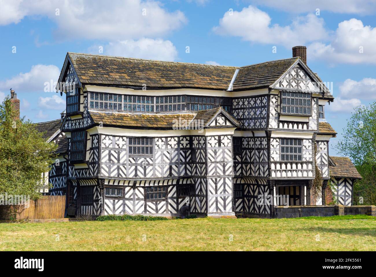 Little Moreton Hall a grade1 listed building black and white half timbered Tudor manor house with a moat near Congleton Cheshire England GB UK Europe Stock Photo