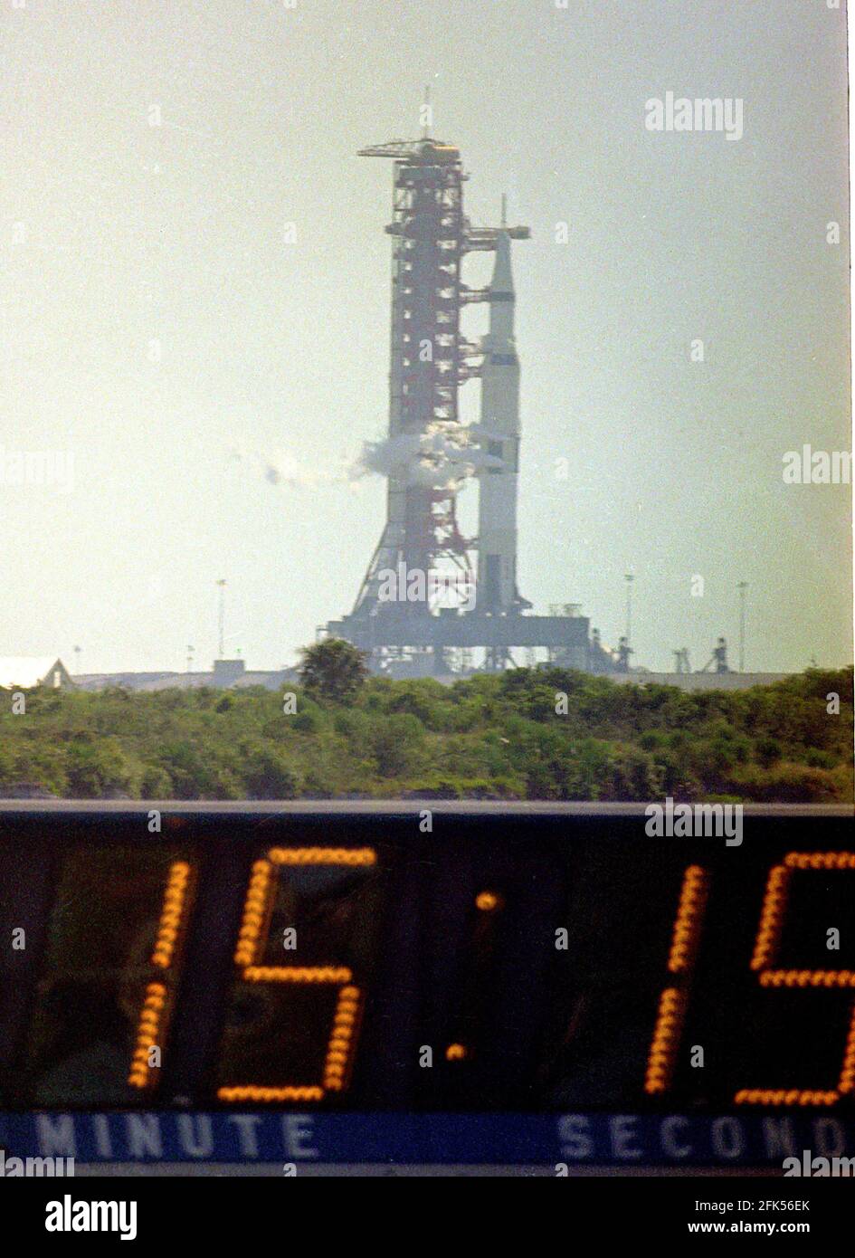 The Saturn V SA-506 launch vehicle with the Apollo 11 astronauts and equipment aboard, is pictured fifteen minutes and fifteen seconds prior to lift-off from Launch Complex 39A at the Kennedy Space Center at Cape Canaveral, Florida on Wednesday, July 16, 1969. It will launch the first manned mission to land on the Moon. Credit: Ron Sachs/CNP /MediaPunch Stock Photo