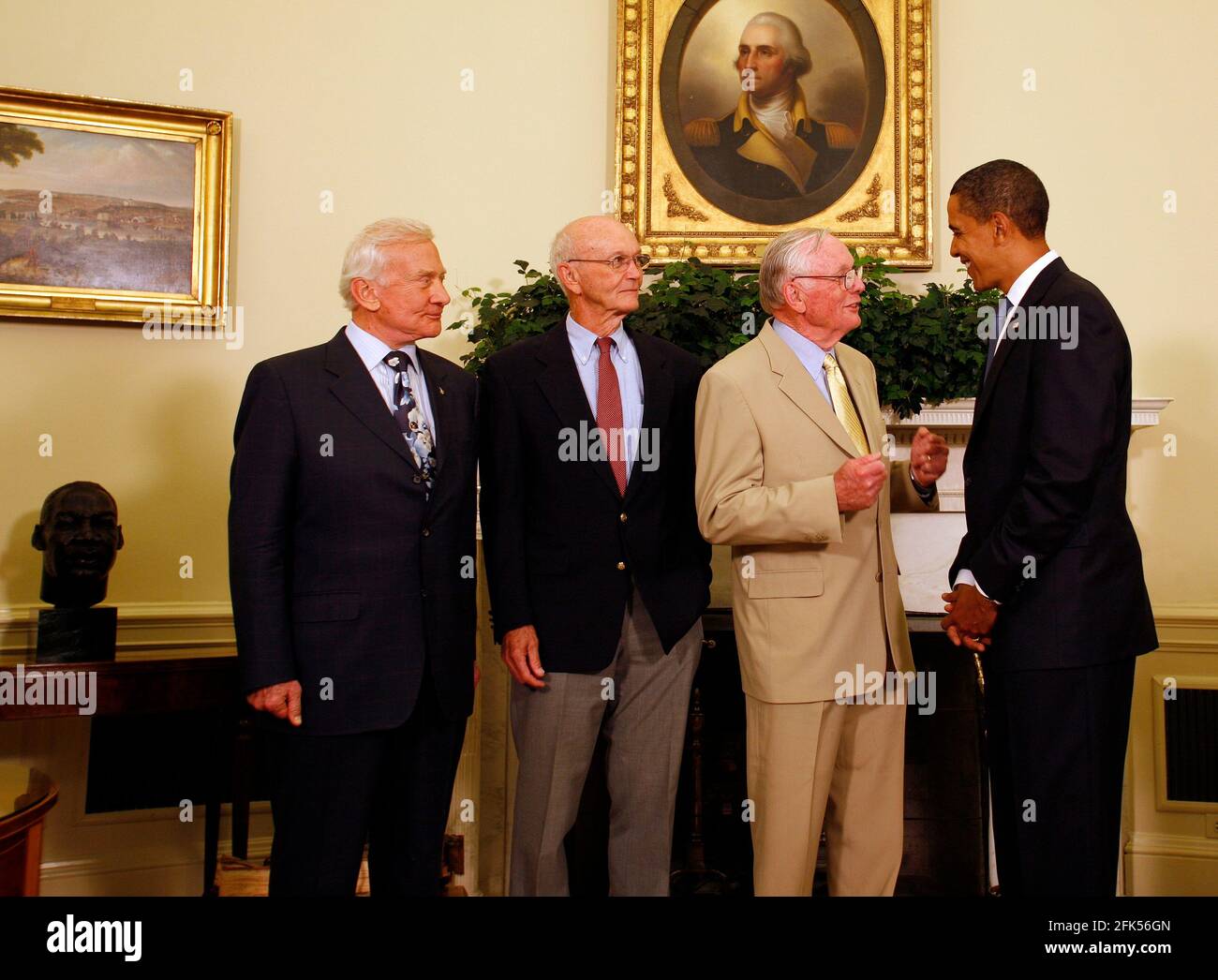 Washington, DC - July 20, 2009 -- United States President Barack Obama meets with Apollo 11 crew members (l-r) Edwin Eugene 'Buzz' Aldrin, Jr., Michael Collins, and Neil Armstrong in the Oval Office of the White House on the 40th anniversary of the astronauts' lunar landing, Washington, DC, Monday, July 20, 2009. Credit: Martin H. Simon/Pool via CNP /MediaPunch Stock Photo
