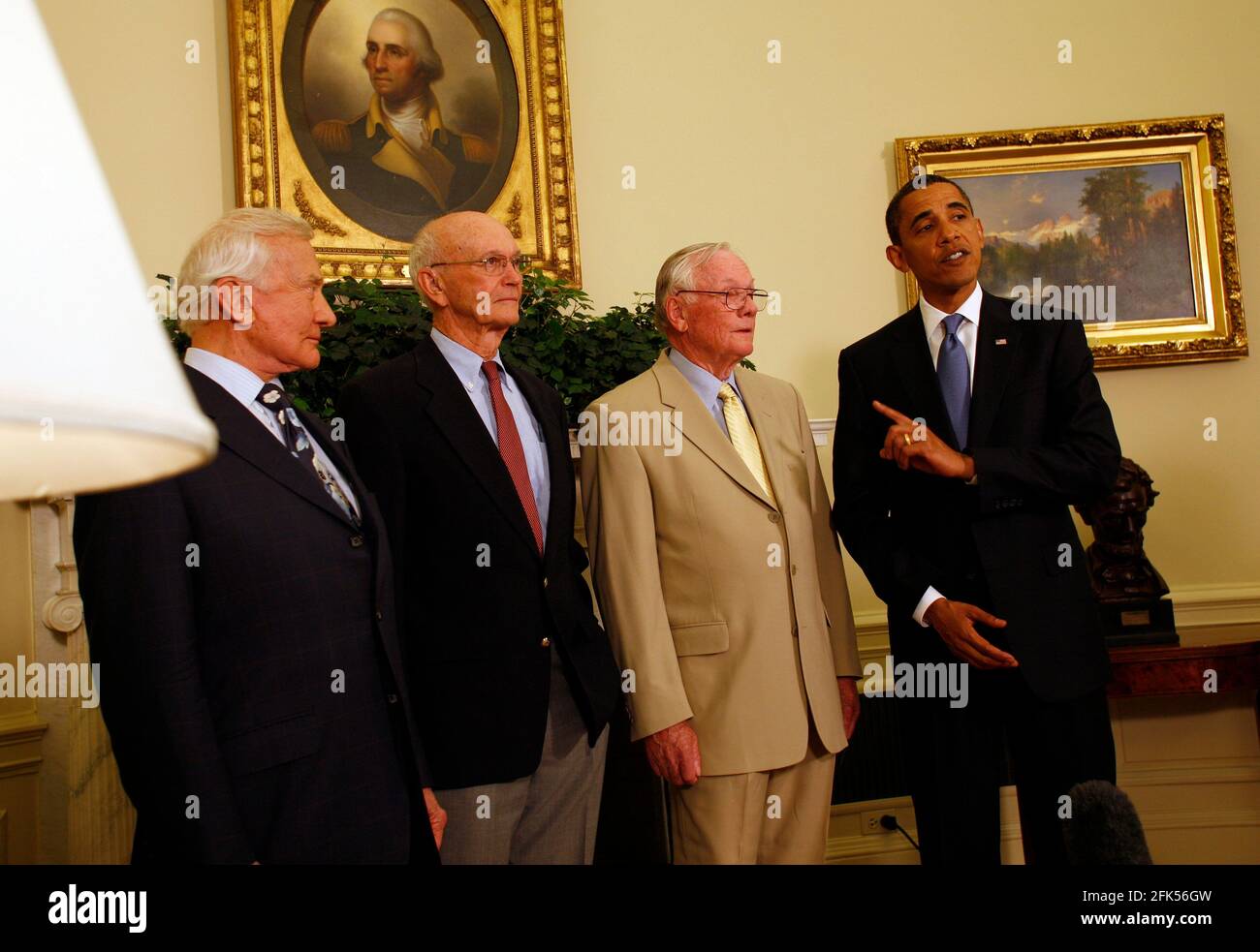 Washington, DC - July 20, 2009 -- United States President Barack Obama meets with Apollo 11 crew members (l-r) Edwin Eugene 'Buzz' Aldrin, Jr., Michael Collins, and Neil Armstrong in the Oval Office of the White House on the 40th anniversary of the astronauts' lunar landing, Washington, DC, Monday, July 20, 2009. Credit: Martin H. Simon/Pool via CNP /MediaPunch Stock Photo