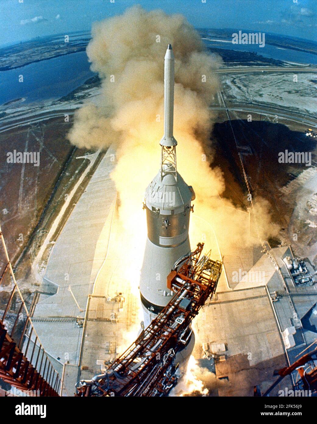 Cape Canaveral, FL - (FILE) -- At 9:32 a.m. EDT, Wednesday, July 16, 1969, the swing arms move away and a plume of flame signals the liftoff of the Apollo 11 Saturn V space vehicle and astronauts Neil A. Armstrong, Michael Collins and Edwin E. Aldrin, Jr. from Kennedy Space Center Launch Complex 39A.Credit: NASA via CNP /MediaPunch Stock Photo