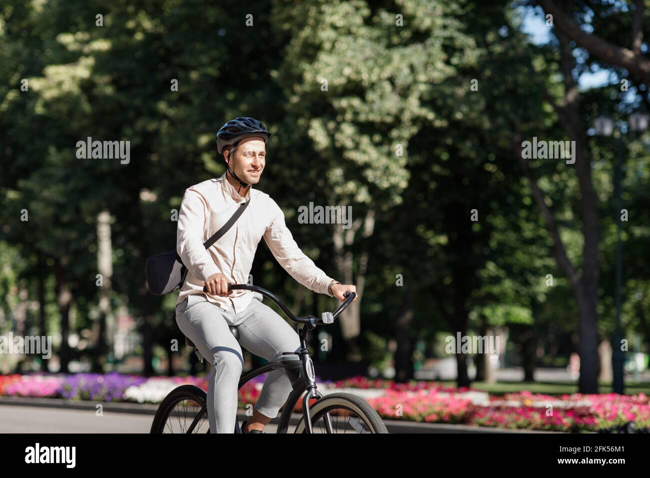 Businessman in park and active sports lifestyle in city Stock Photo