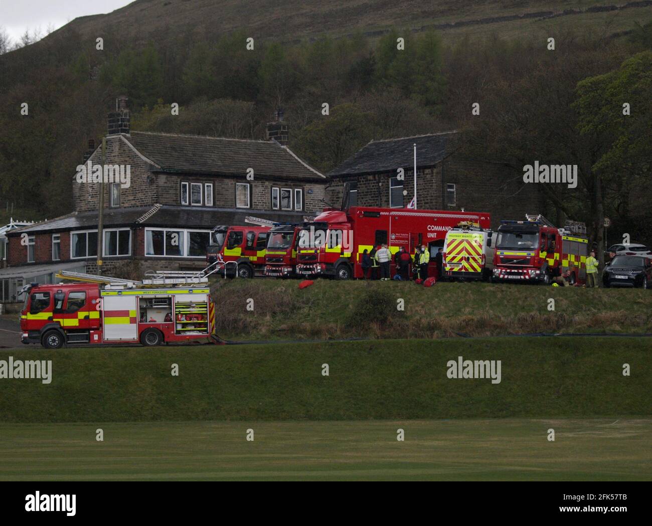 West Yorkshire Fire & Rescue Service tackle a moorland wildfire on the National Trust's Marsden Moor Estate between Redbrook and Butterley Reservoirs. Stock Photo