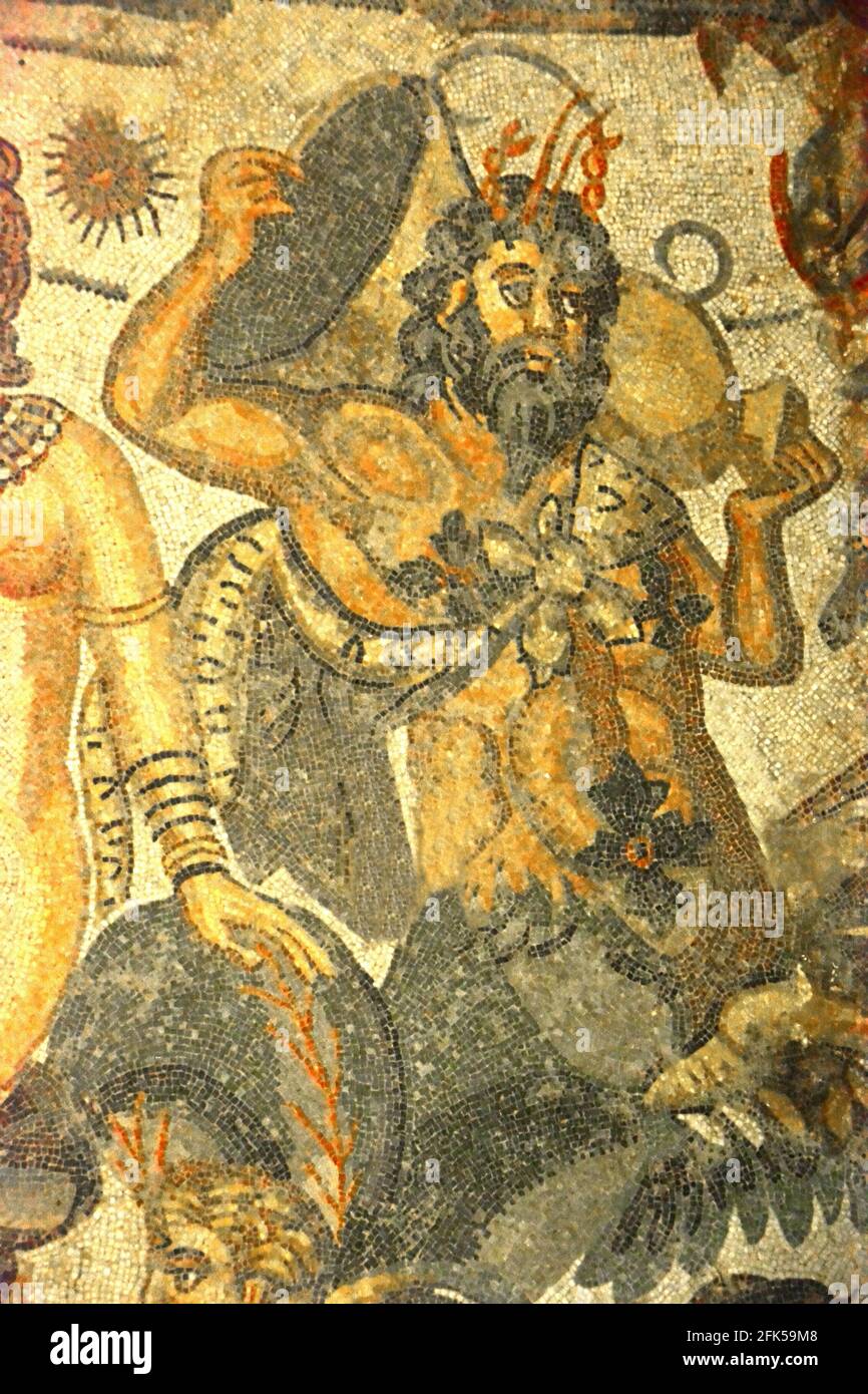 An ancient roman mosaic depicting the Titan Oceanus. From the Hall of Arion in the UNESCO listed Ancient Roman mosaics in the Villa Romana del Casale, Stock Photo