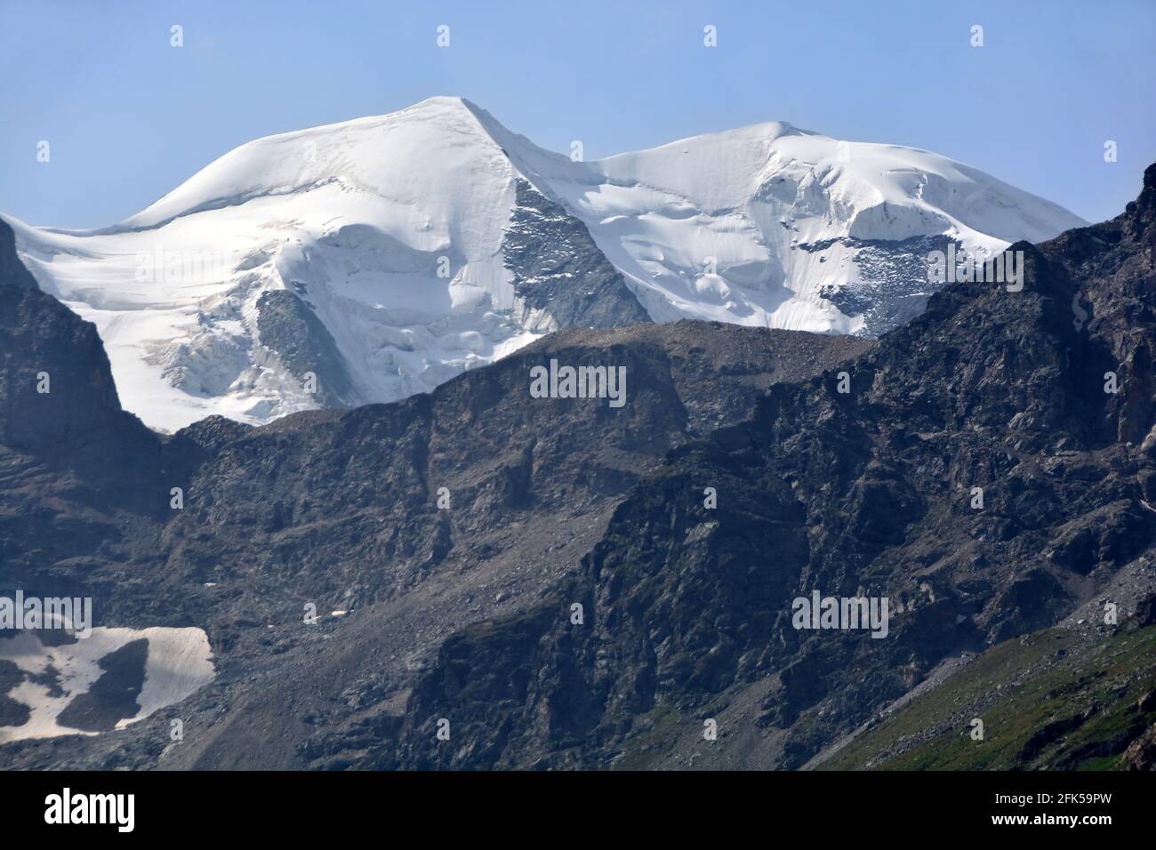The Piz Palu viewed from the Bernina Pass in southern Switzerland above St Moritz. Stock Photo