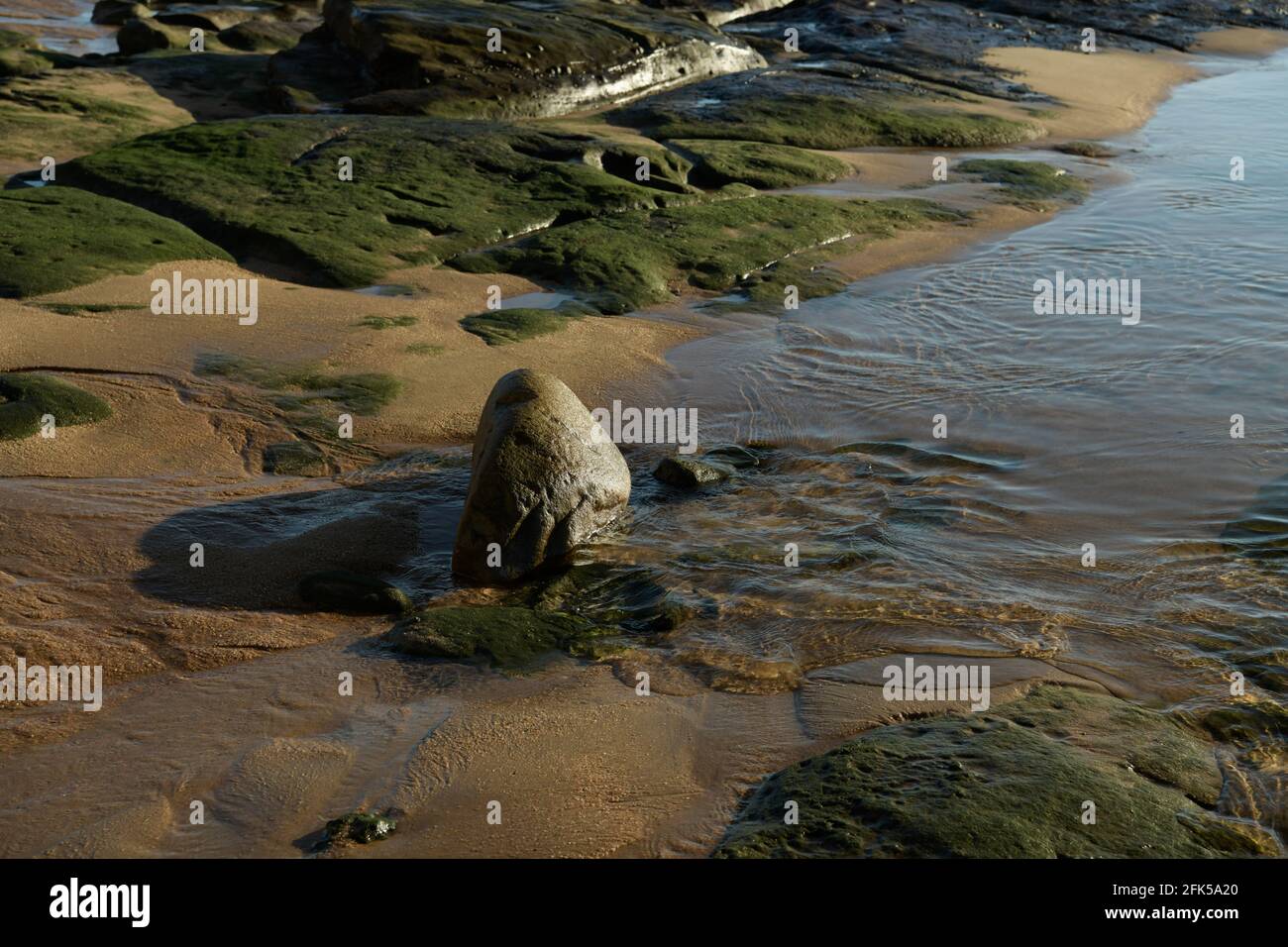 Backgrounds, beauty in nature, close up of water in sea tidal pool, grunge, coastal still life, abstract of rock, Umhlanga Rocks beach, South Africa Stock Photo