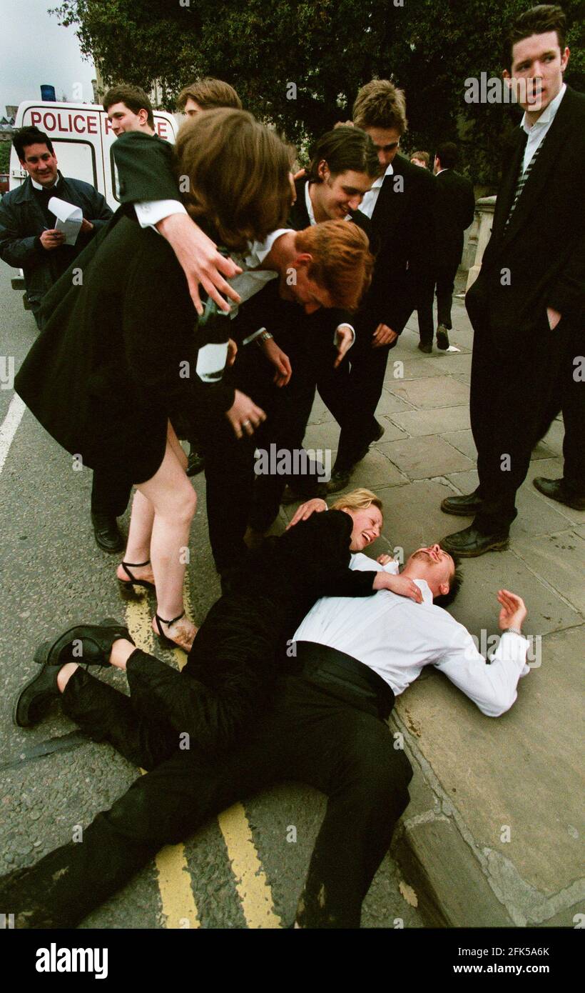 Oxford University May Day Celebrations May 1998 A student collapsed on Magdalen bridge Oxford after a night partying at the May Ball Stock Photo