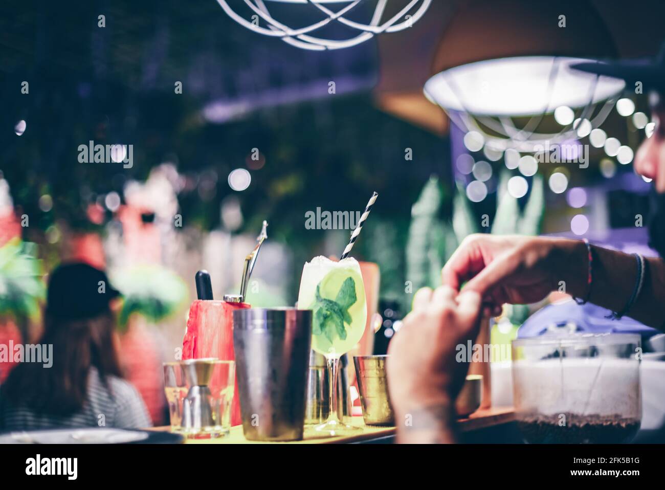 Refreshing lemonade drink with lemon and water, with ice. Stock Photo