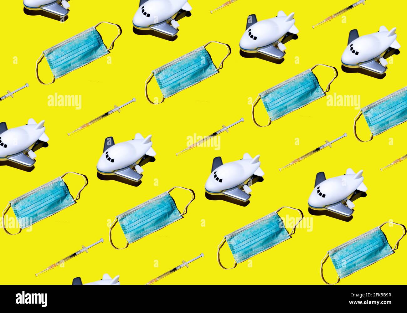Pattern of airplanes face masks and vaccines on yellow background