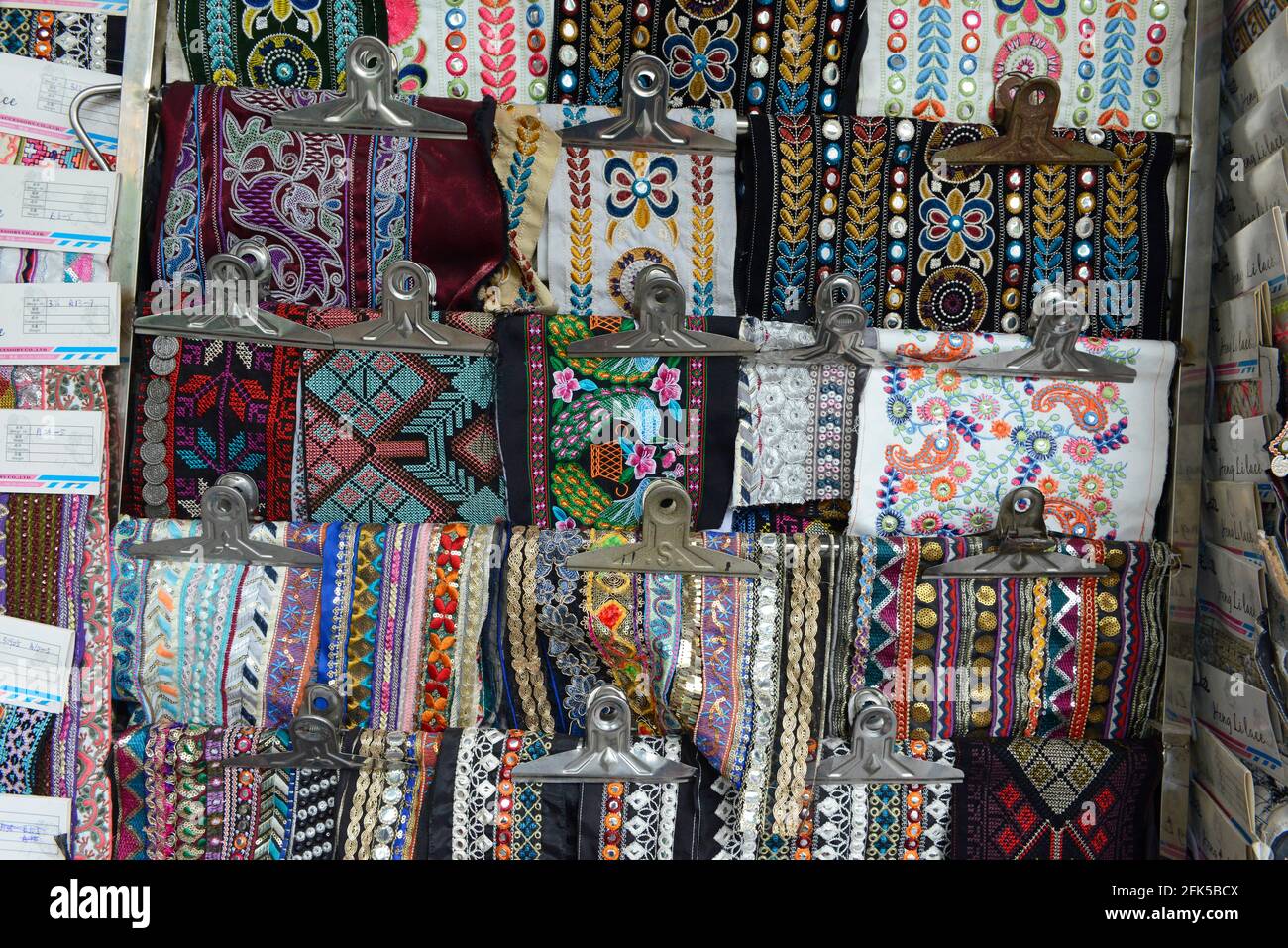 Patterned ribbons for sale at a clothing market near Zhongshan University in Guangzhou, China Stock Photo