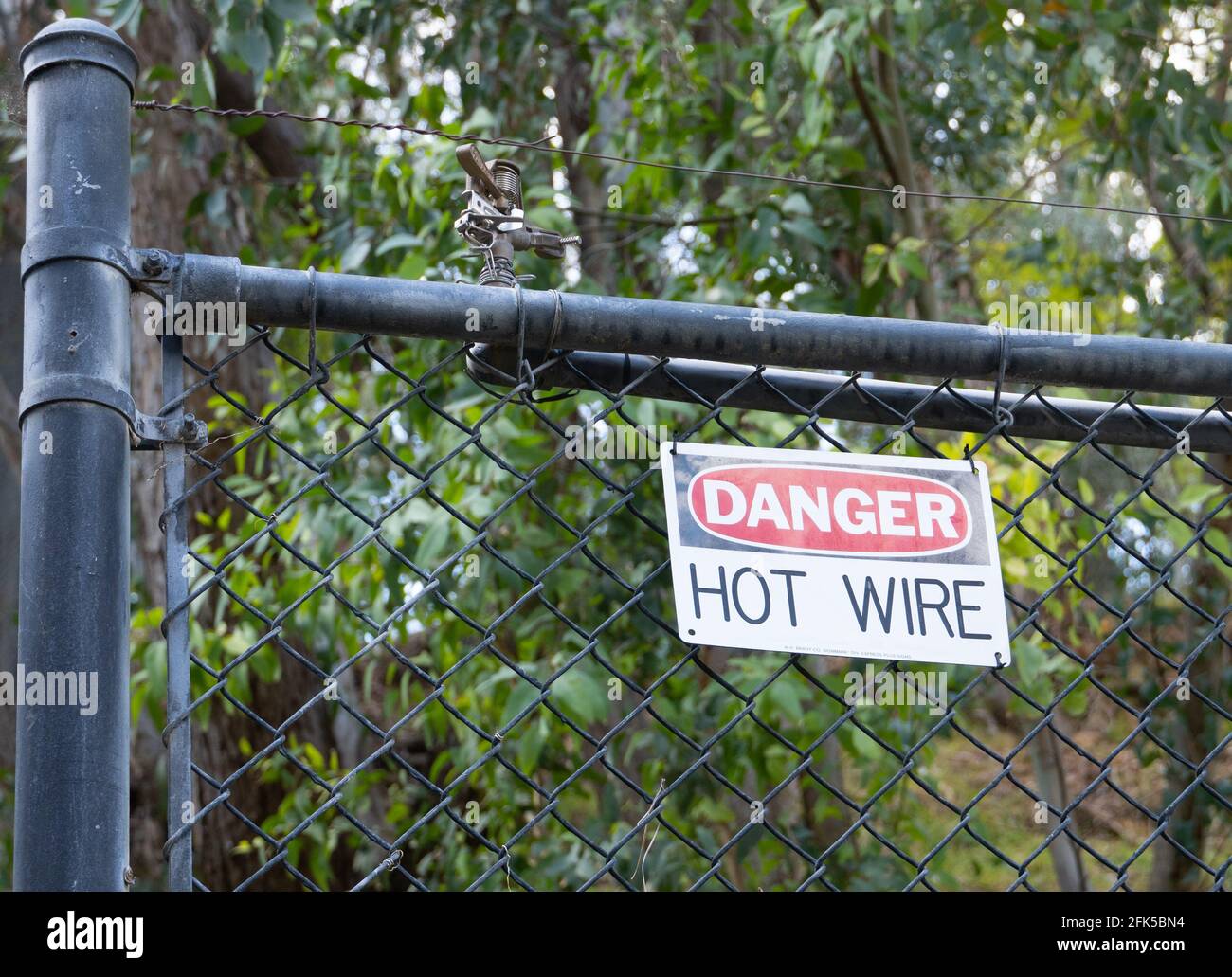 Danger hot wire sign at the Los Angeles Zoo Stock Photo