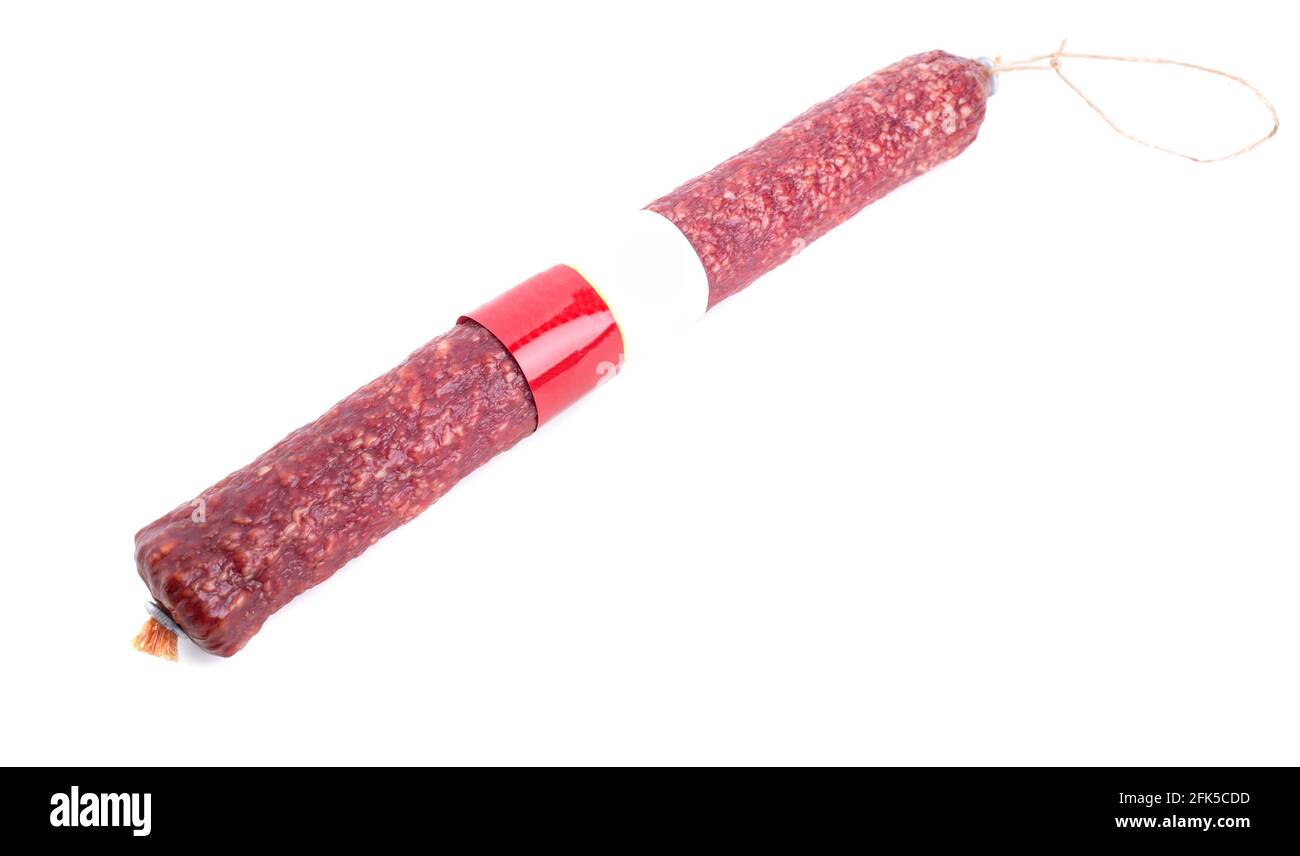 Delicious italian airdried beef and pork salami stick in natural casing. Isolated on a white