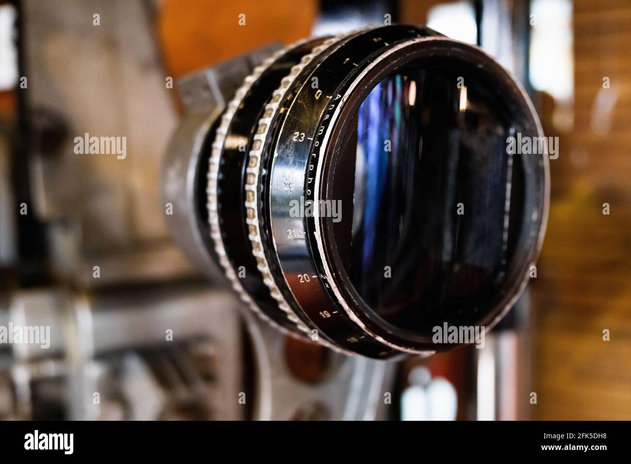 Old anamorphic glass lens on an old movie projector Stock Photo Alamy