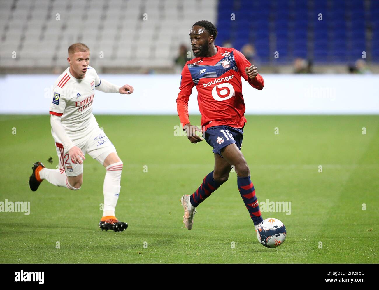 Jonathan Ikone of Lille, Melvin Bard of Lyon (left) during the French  championship Ligue 1 football match between Olympique Lyonnais (OL) and  Lille OSC (LOSC) on April 25, 2021 at Groupama Stadium