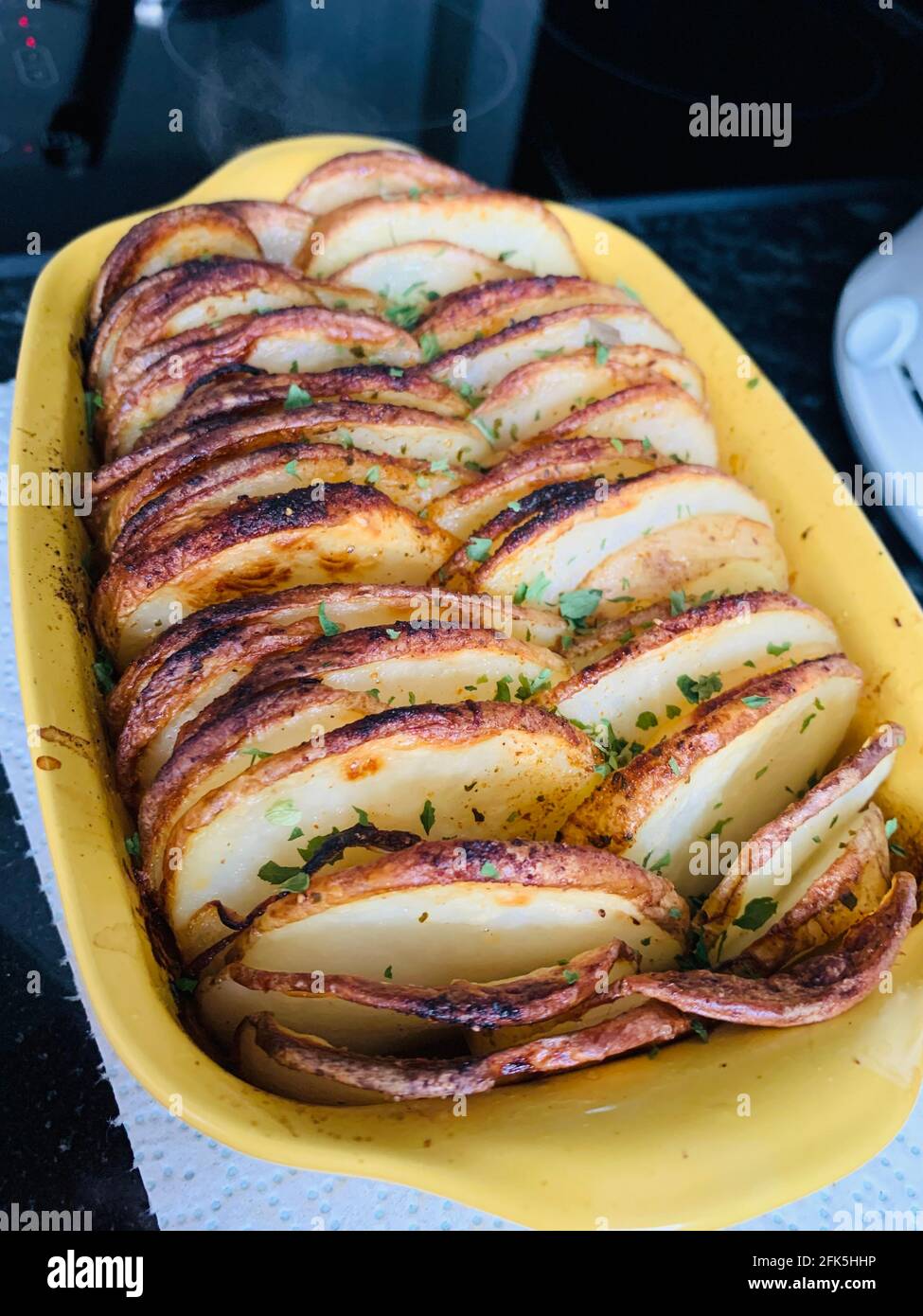 Crispy, seasoned potatoes Stock Photo