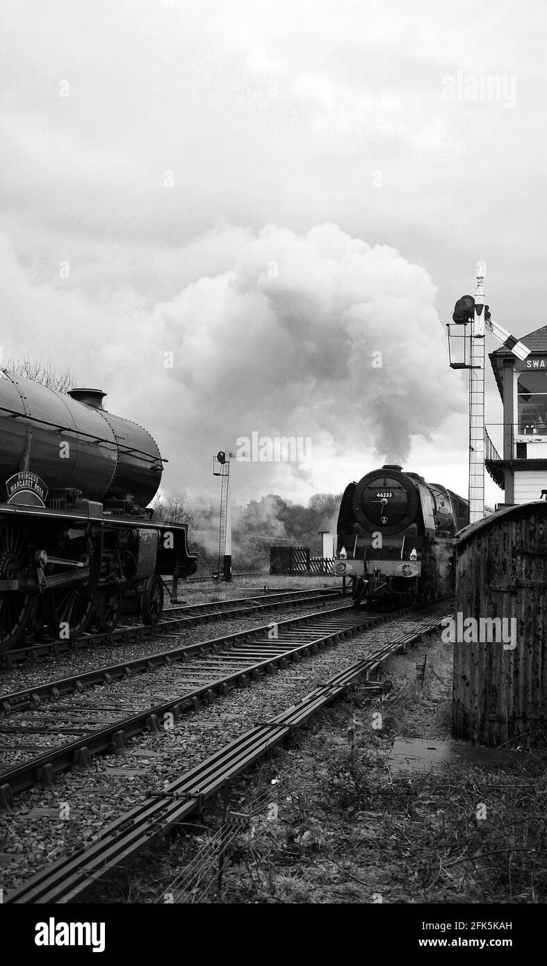 'Duchess of Sutherland' crossing 'Princess Margaret Rose' at Swanwick Junction. Stock Photo