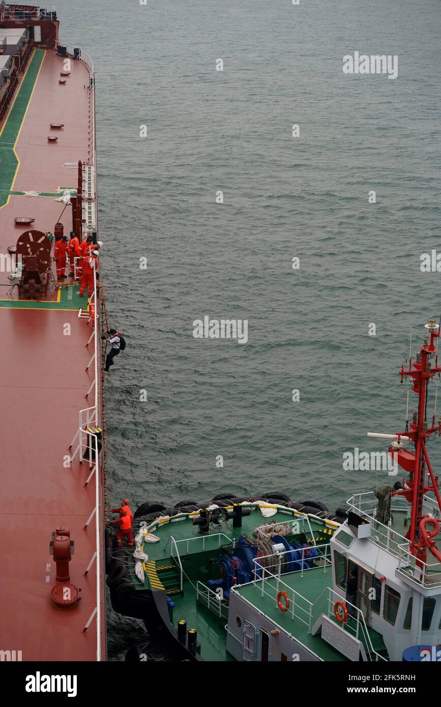 pilot disembarkation at sea Stock Photo