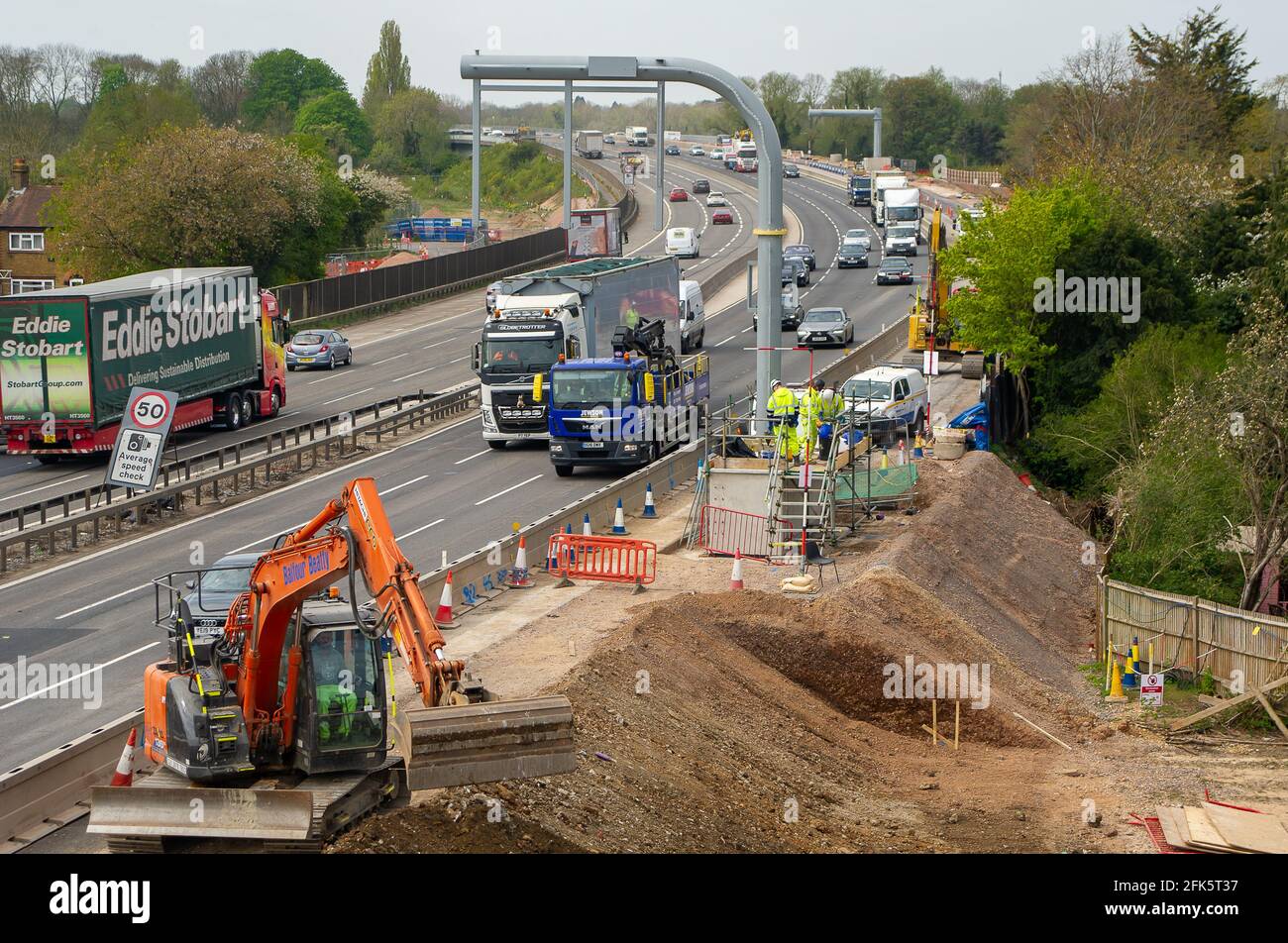 Dorney Reach, Buckinghamshire, UK. 27th April, 2021. A new gantry being built above the M4 at