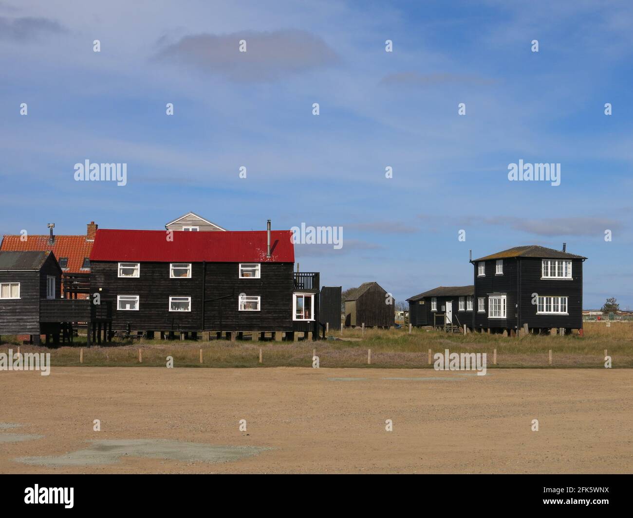 Suffolk architecture wooden black clapboard houses near the beach at