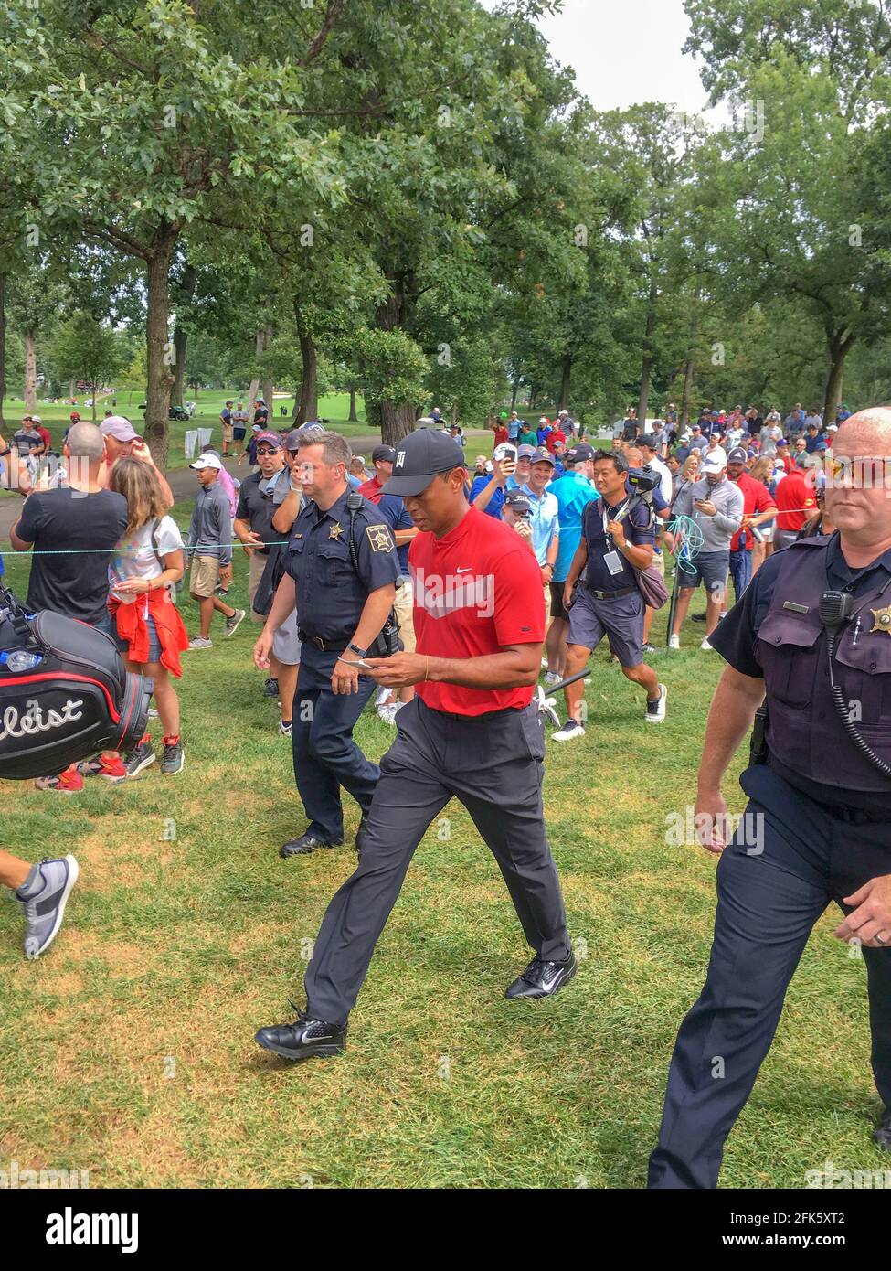 Tiger Woods walking to the next Tee Stock Photo