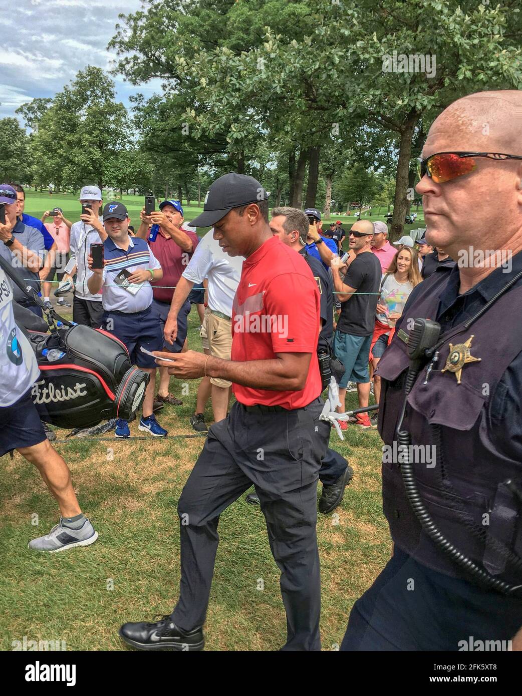 Tiger Woods walking to the next Tee Stock Photo