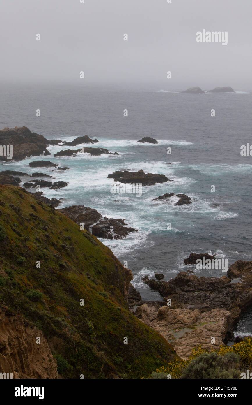 Big Sur Coastline Scenery, Pacific ocean, fog, rocks, surf, Highway 1, tourism, Central Coast, California Stock Photo