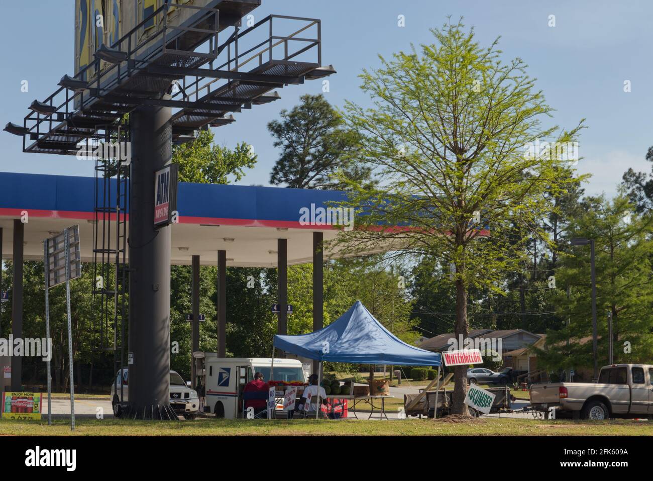 Augusta, Ga USA 04 27 21 Urban scene Produce stand signs on a corner