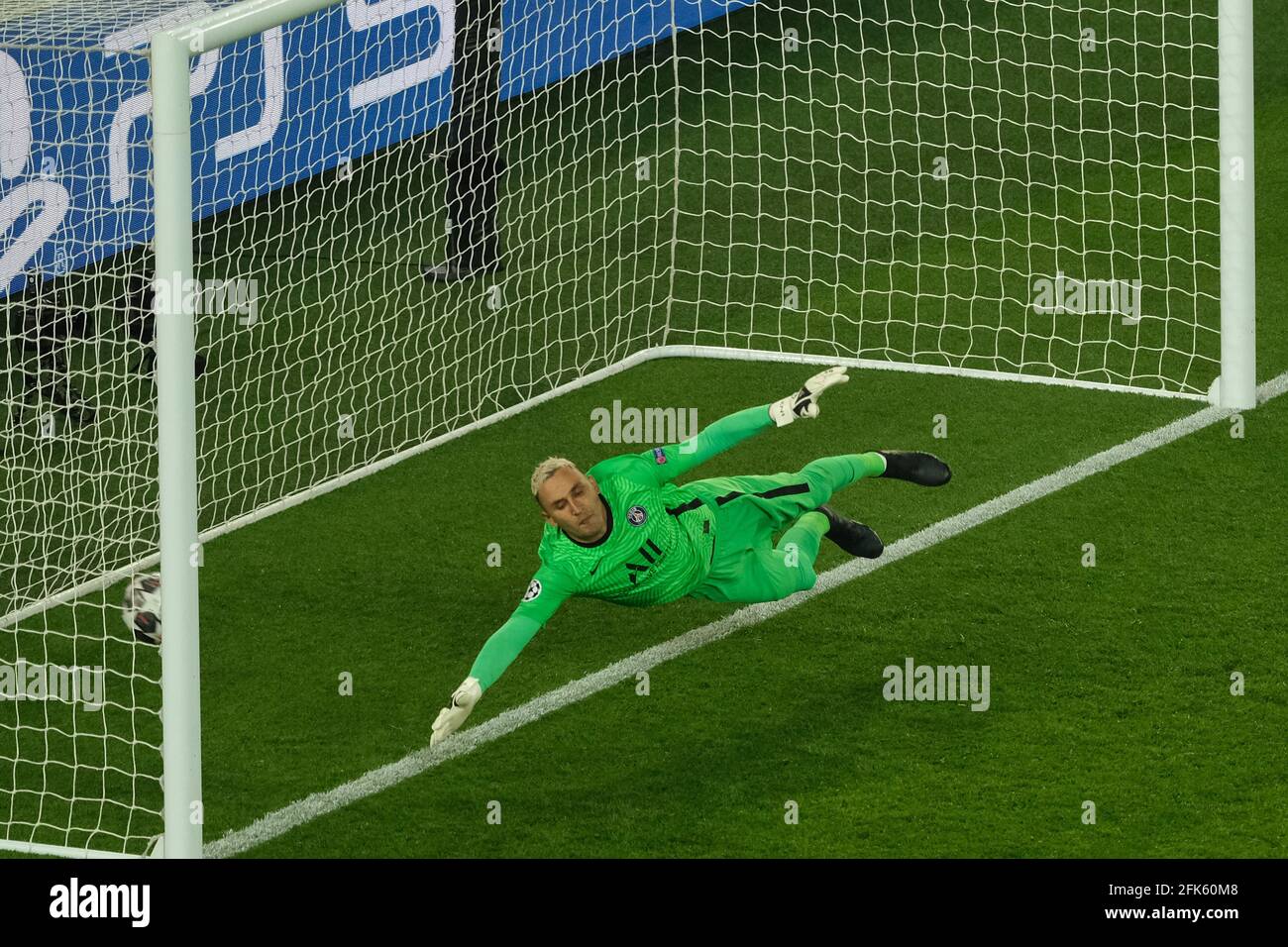 Paris, France. 28th Apr, 2021. RIYAD MAHREZ Manchester City scores his team's second goal at KEYLOR NAVAS goalkeeper of Paris SG during the Champions League semi-final between Paris Saint Germain and Manchester City at Parc des Princes Stadium - Paris FranceParis SG Goalkeeper KEYLOR NAVAS in action during the semi-final of the UEFA Champions League between Paris Saint Germain and Manchester City at Parc des Princes Stadium - Paris France.Manchester City won 2:1 Credit: Pierre Stevenin/ZUMA Wire/Alamy Live News Stock Photo