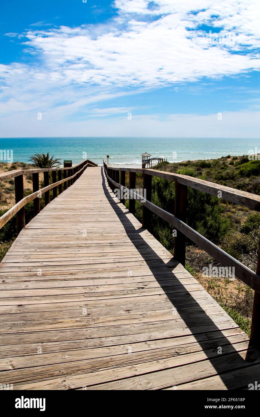 Wooden Walkway To Arenales Del Sol Beach In A Beautiful Morning In Alicante Southern Spain Stock Photo Alamy
