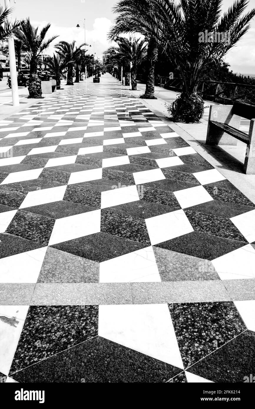 Promenade in Arenales del Sol village in Alicante, Spain. Monochrome picture Stock Photo