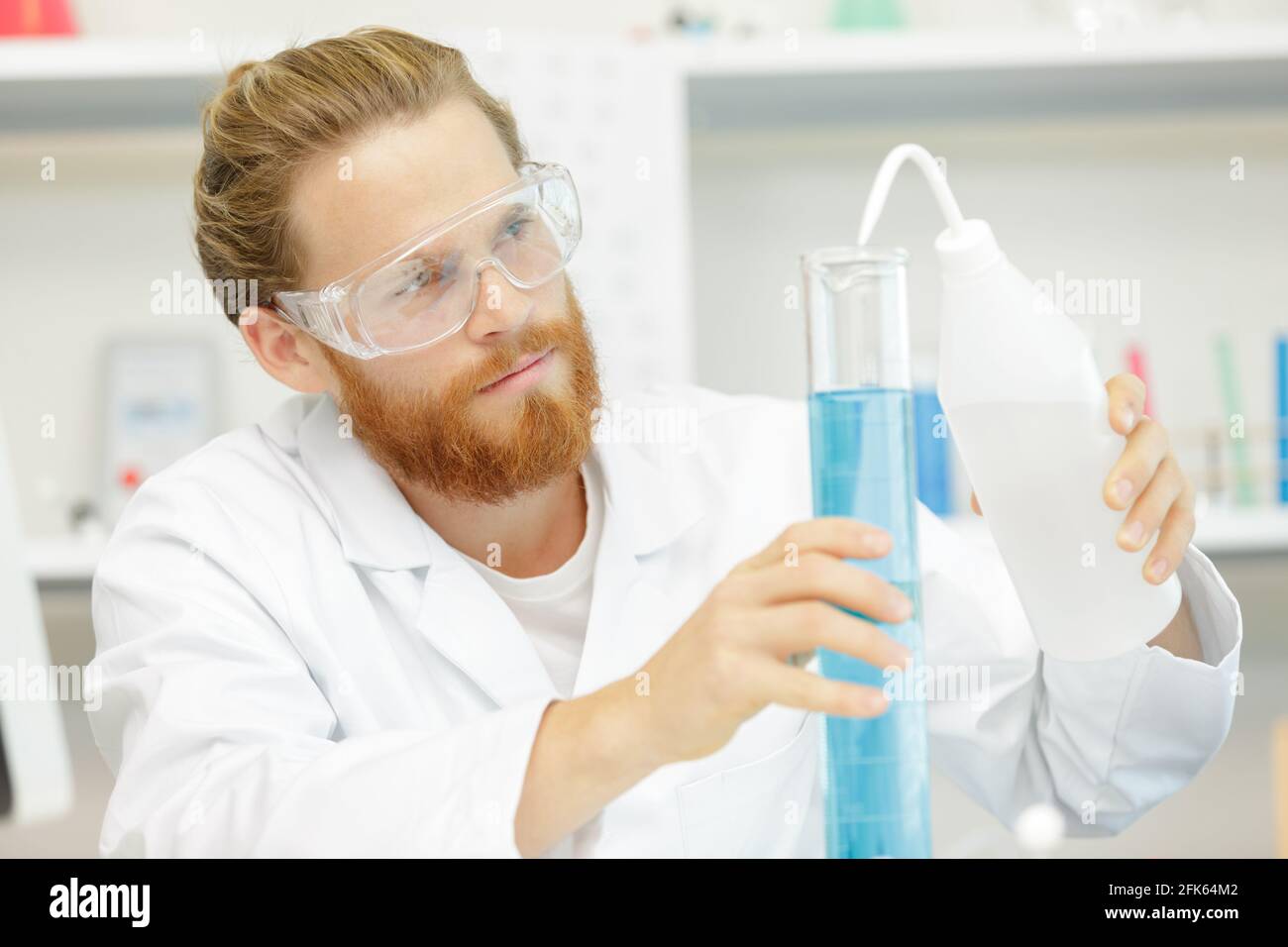 Close up researchers in chemistry lab hi-res stock photography and ...