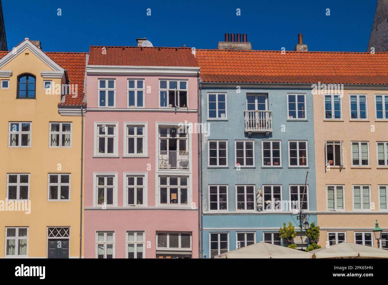 Colorful houses of Nyhavn district in Copenhagen, Denmark Stock Photo