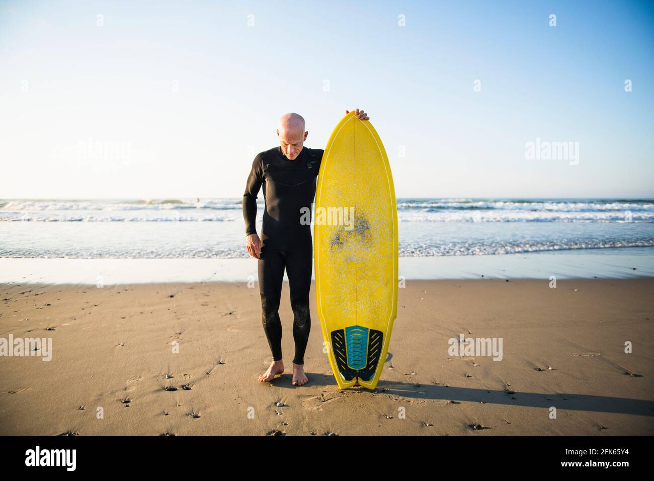 Strong male surfer hi-res stock photography and images - Alamy