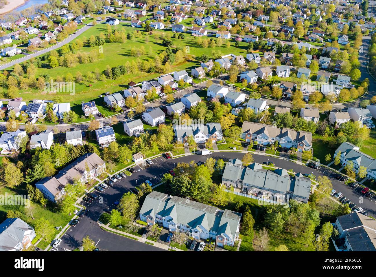 Scenic aerial view of a suburban settlement in USA with detached houses