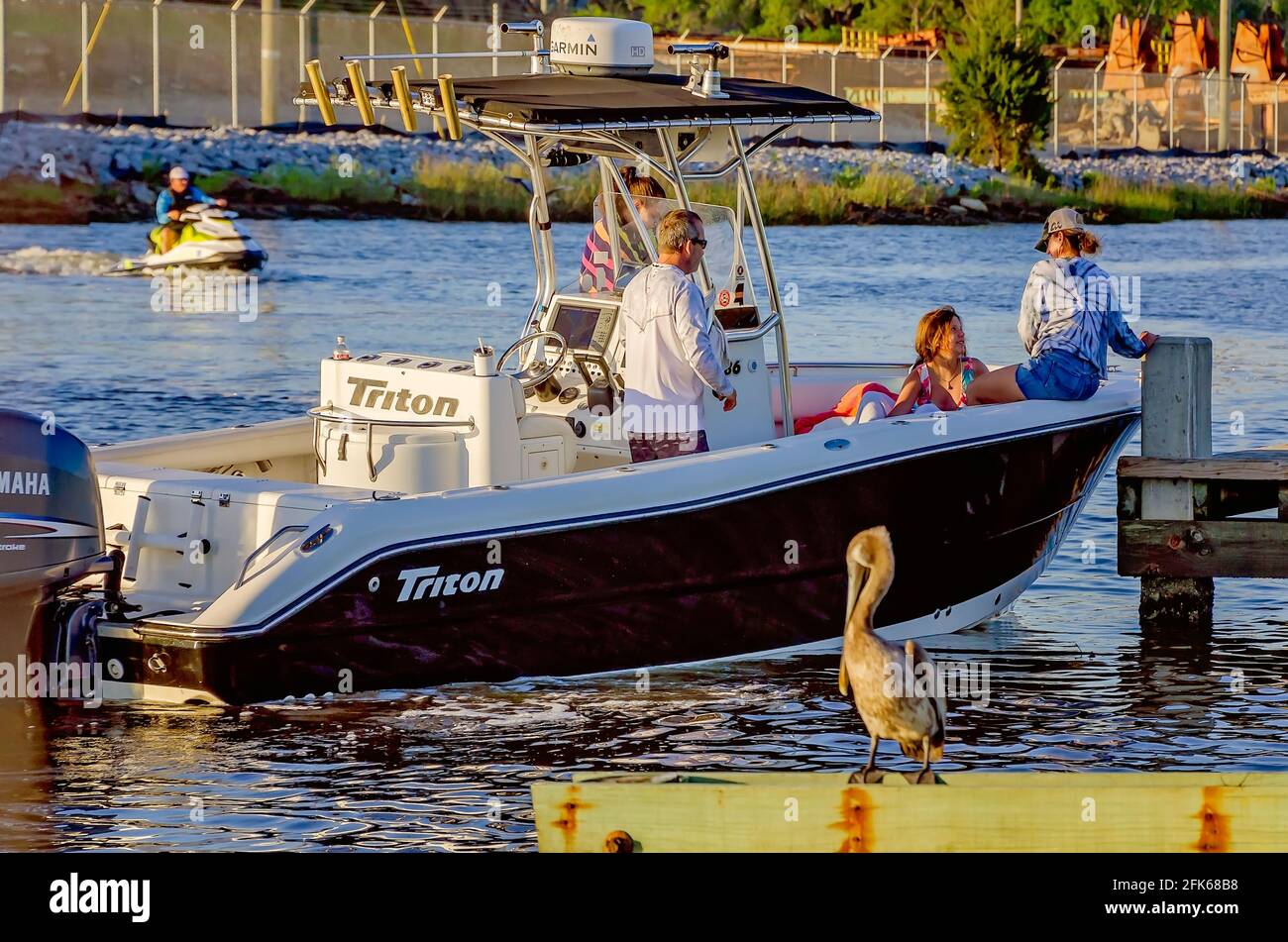 A family launches their boat at Point Park, April 25, 2021, in