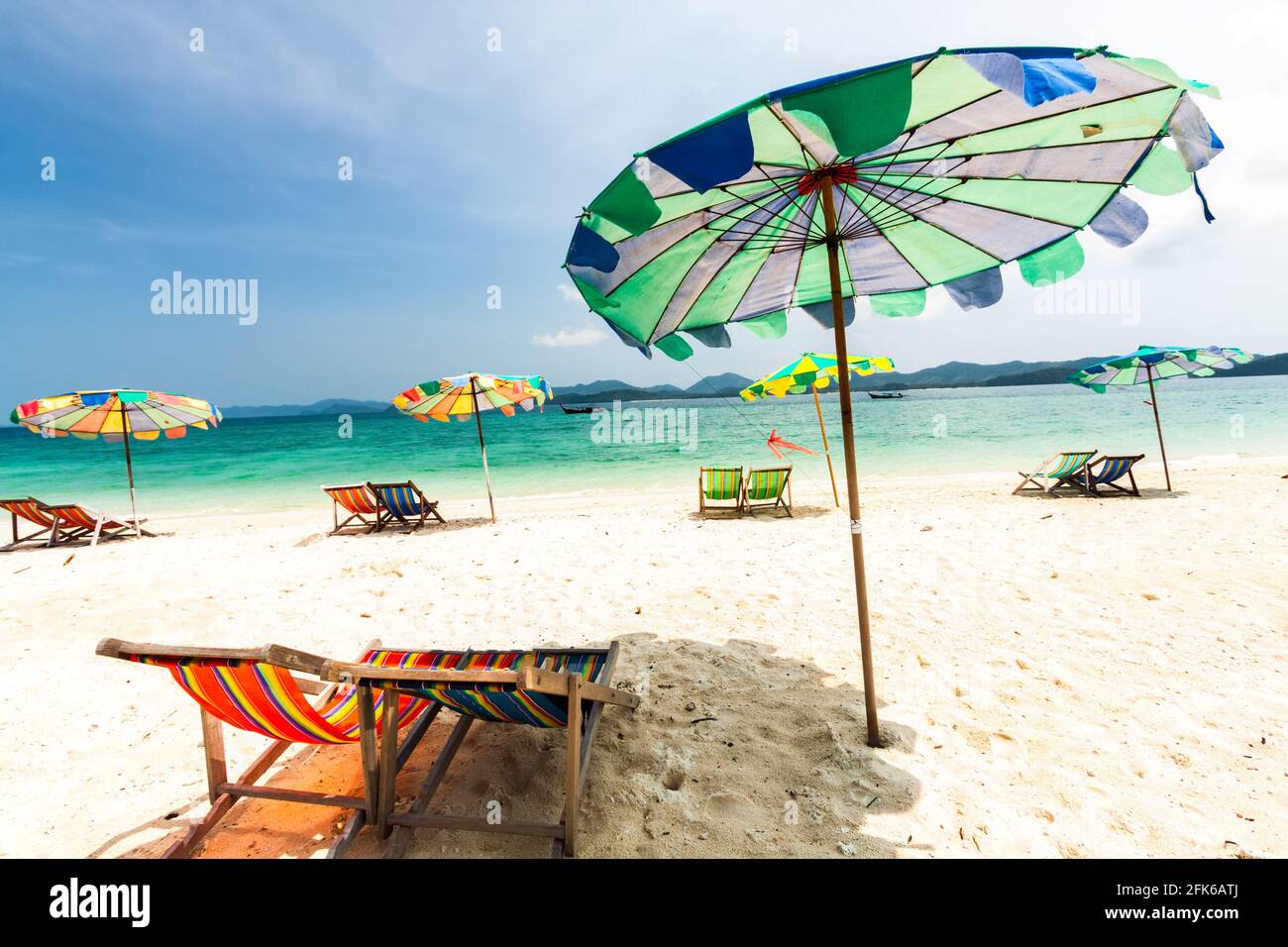 Colorful Chairs And Umbrella On Tropical Beach At Koh Khai Nok Island Phuket Province Thailand