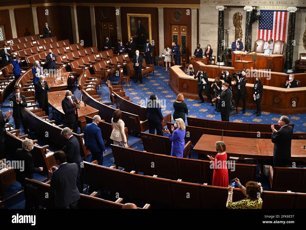 Members of Congress clap as US Vice President Kamala Harris (C) arrives ...