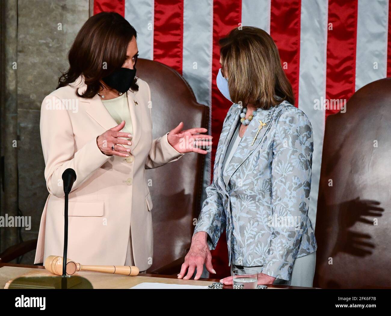 Washington, United States. 28th Apr, 2021. Vice President Kamala Harris (L) talks with Speaker of the US House of Representatives Nancy Pelosi (D-CA) before President Joe Biden delivers his first address to a joint session of Congress two days before his 100th day in office, at the U.S. Capitol in Washington DC, on Wednesday, April 28, 2021. Pool photo by Jim Watson/UPI Credit: UPI/Alamy Live News Stock Photo