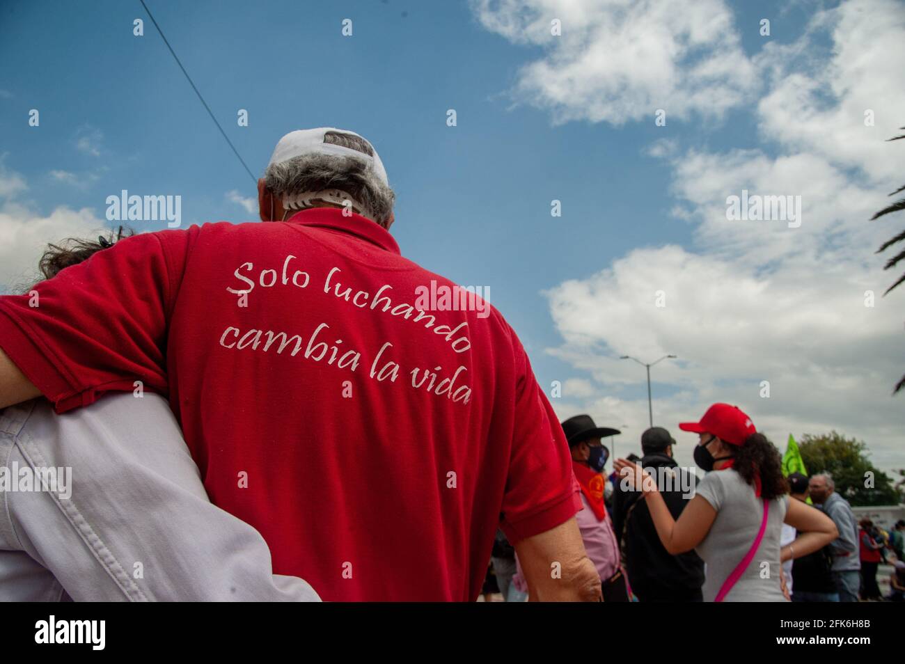 Bogota, Cundinamarca, Colombia. 28th Apr, 2021. A demonstrator with a shirt with the message ''Only Fighting Life Changes'' as Colombians marched in streets of Bogota, Colombia on April 28, 2021 to protest against the tributary reform of president Ivan Duque Marquez. Credit: Chepa Beltran/LongVisual/ZUMA Wire/Alamy Live News Stock Photo