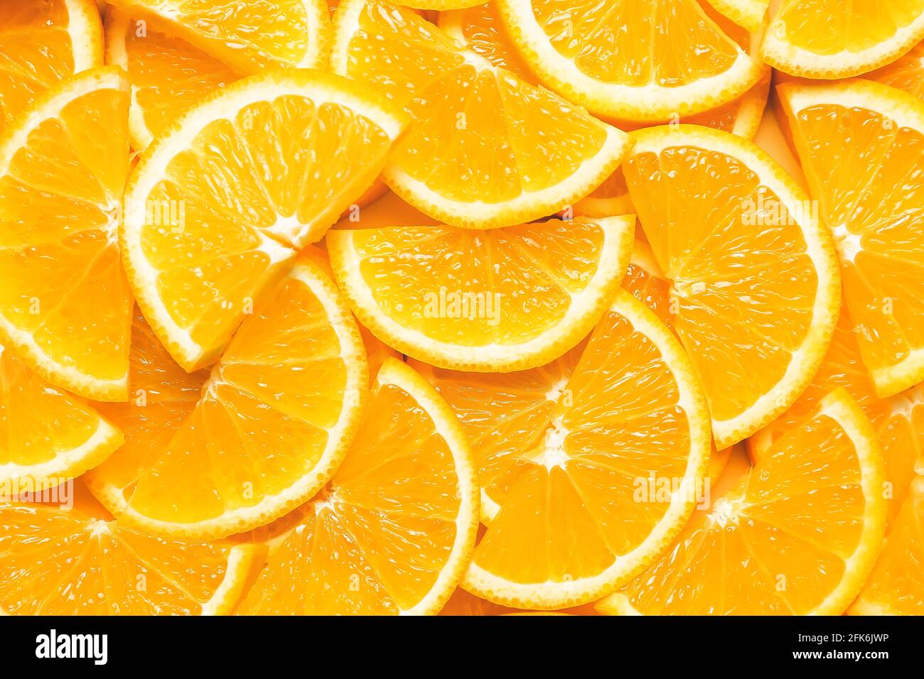 Pieces of fresh oranges as background Stock Photo - Alamy
