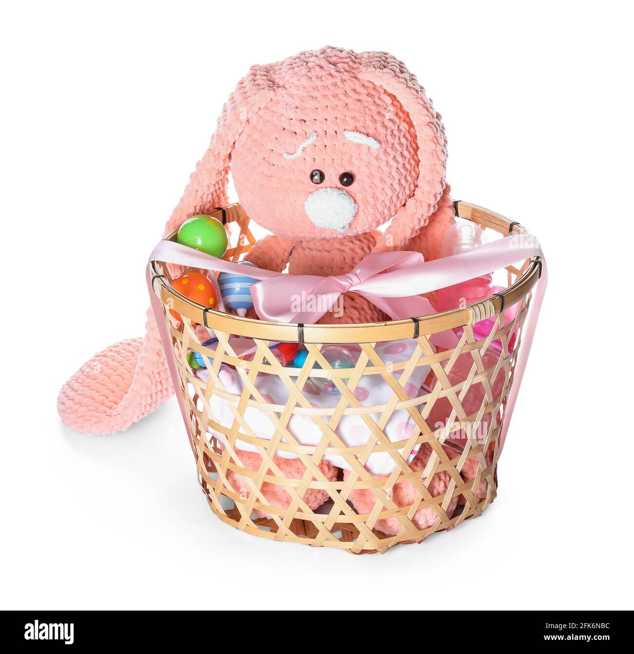 Wicker basket with gifts for baby on white background Stock Photo Alamy