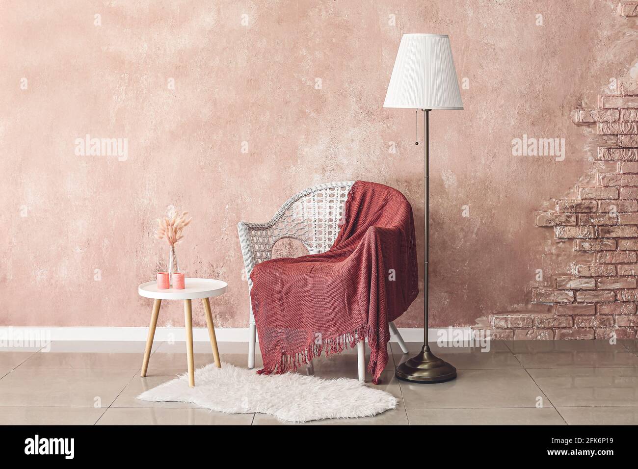 Stylish interior of modern living room with lamp and armchair Stock ...