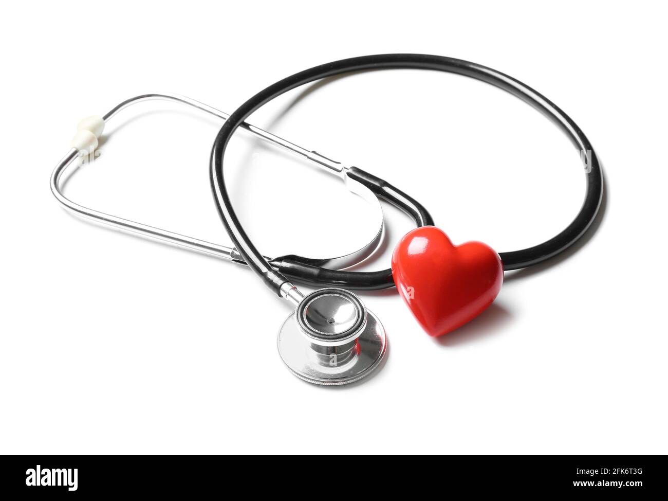 Modern stethoscope and red heart on white background Stock Photo - Alamy