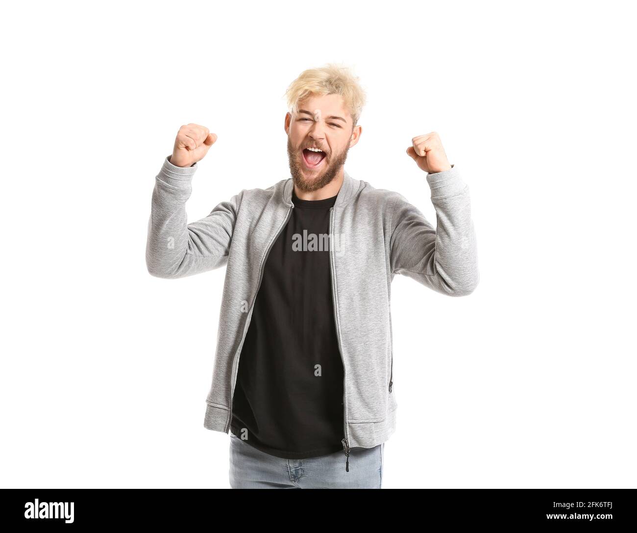 Happy young man on white background Stock Photo - Alamy