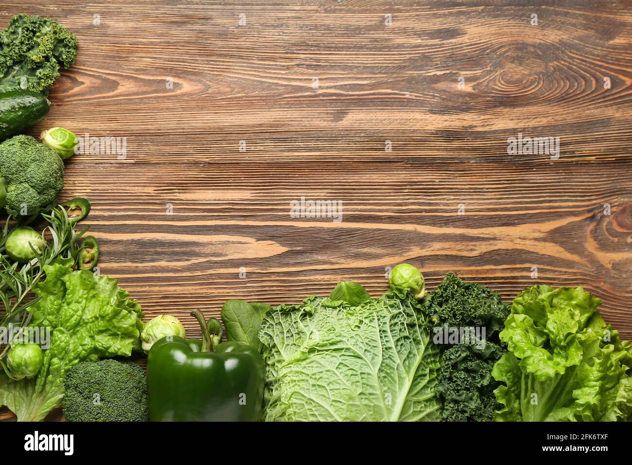 Fresh vegetables on wooden background Stock Photo - Alamy