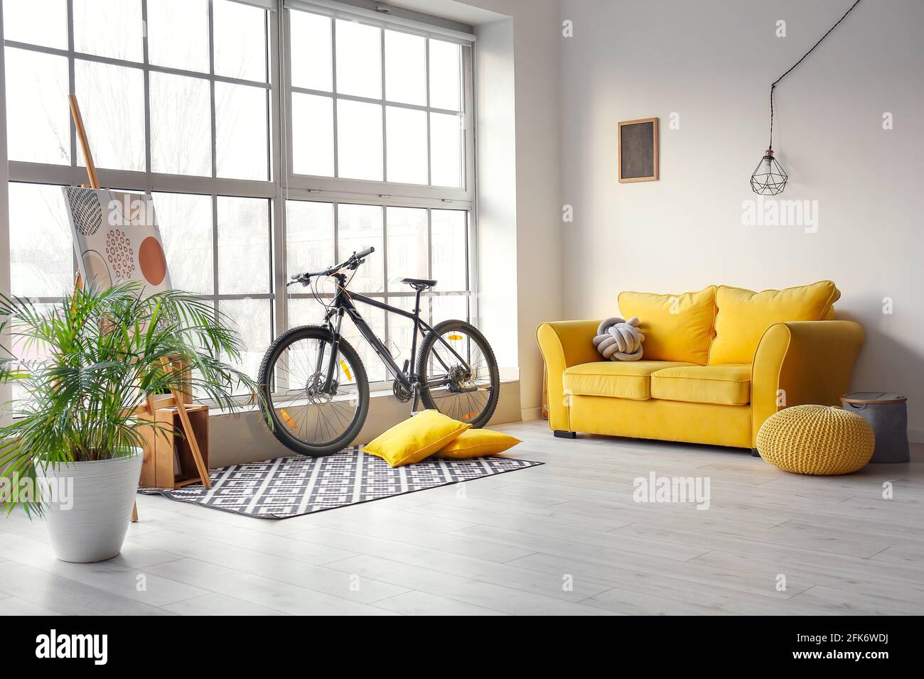 Stylish interior bicycle yellow hi-res stock photography and images - Alamy
