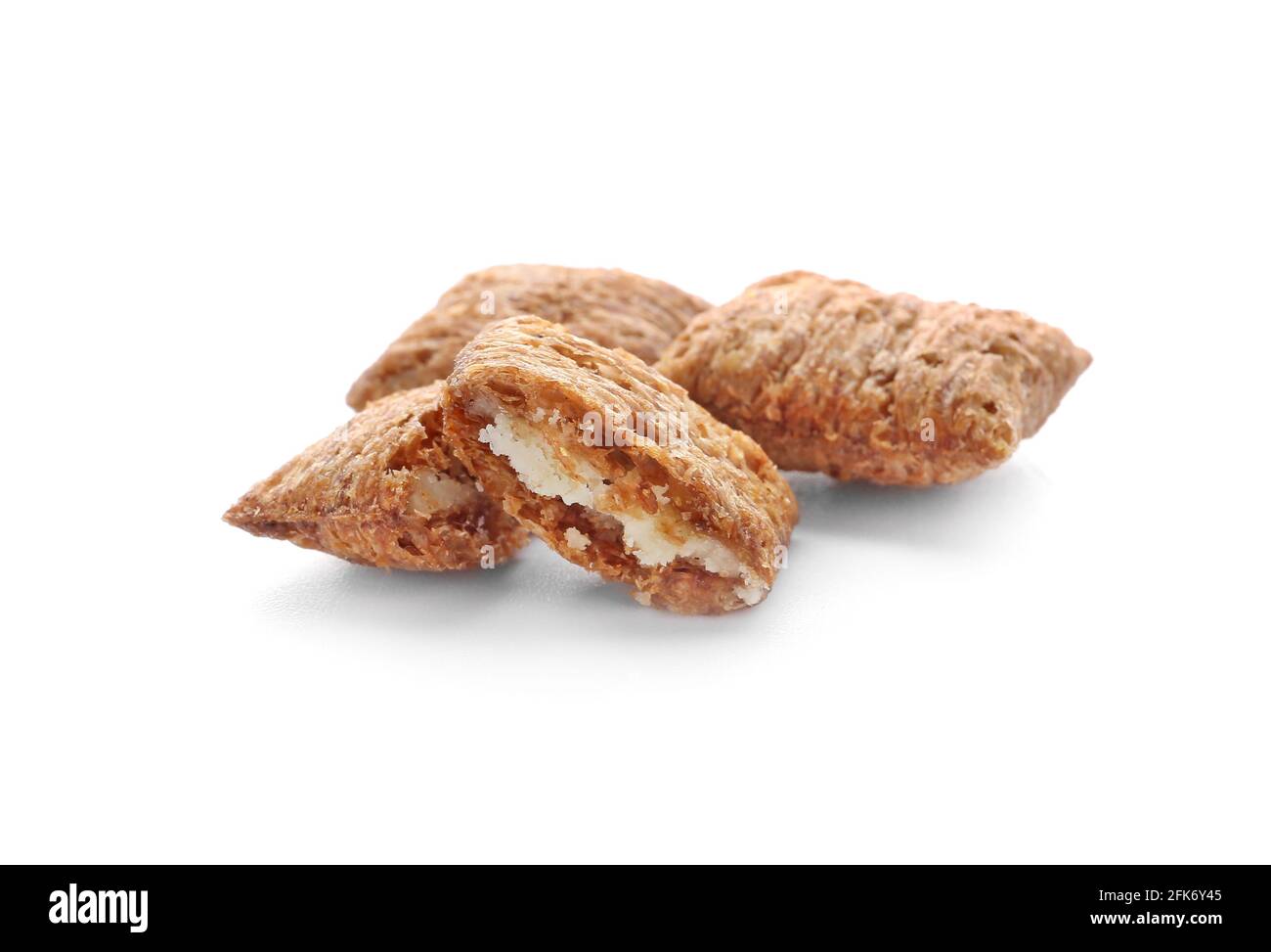 Tasty corn pillows on white background Stock Photo